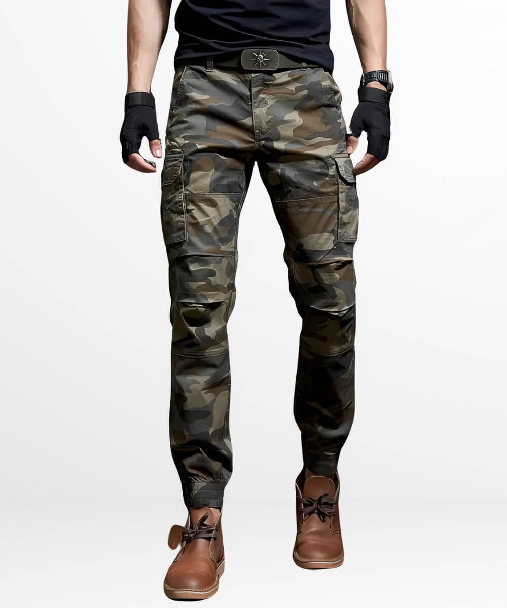 A pair of men's slim-fit camo cargo pants featuring a utility design with multiple pockets and a comfortable fit, paired with brown work boots.