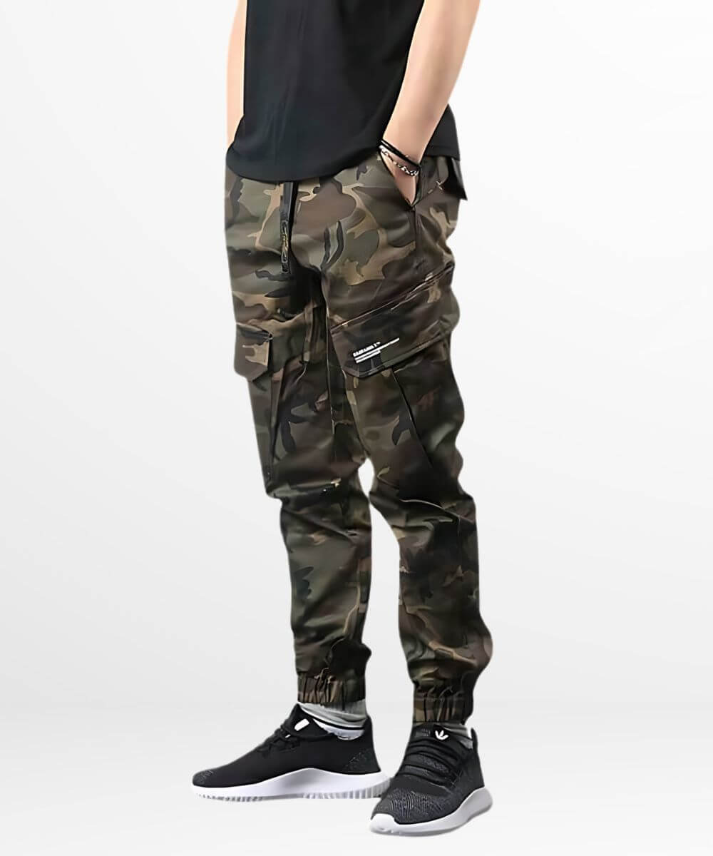 Side angle of men's trendy cargo camo pants, focusing on the utility side pocket and snug ankle fit.