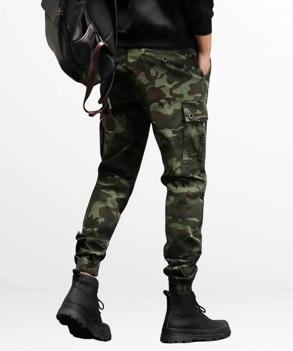Rear view of military-style camo cargo pants with secure flap pockets and a black leather belt.