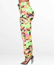 Side view of neon green camo cargo pants featuring multiple pockets and cuffed hem.