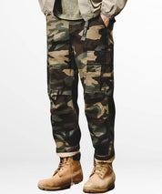 Streetwear vibe with plus-size camo pants for men, combined with durable work boots.