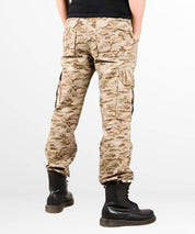 Rear pocket detail of men's desert camo pants, focusing on the practical and stylish aspects.