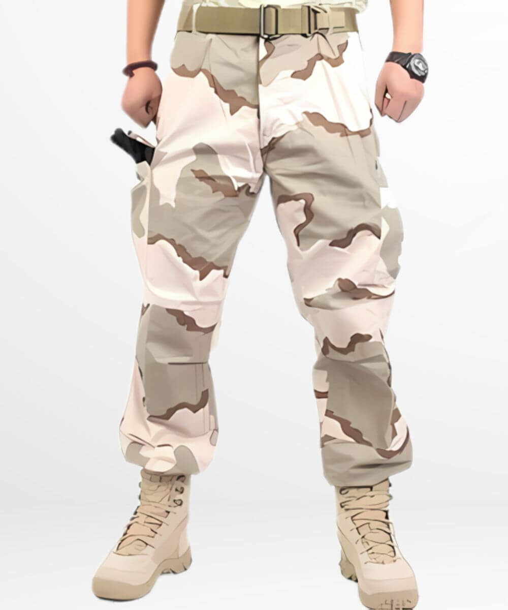 A pair of sand camouflage cargo pants featuring a cinched belt and cuffed ankles, styled with beige combat boots.