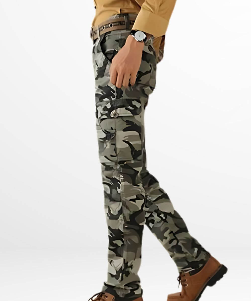 Side view of a man walking in cargo pants for men camo, emphasizing the versatile design suitable for both adventure and casual wear.