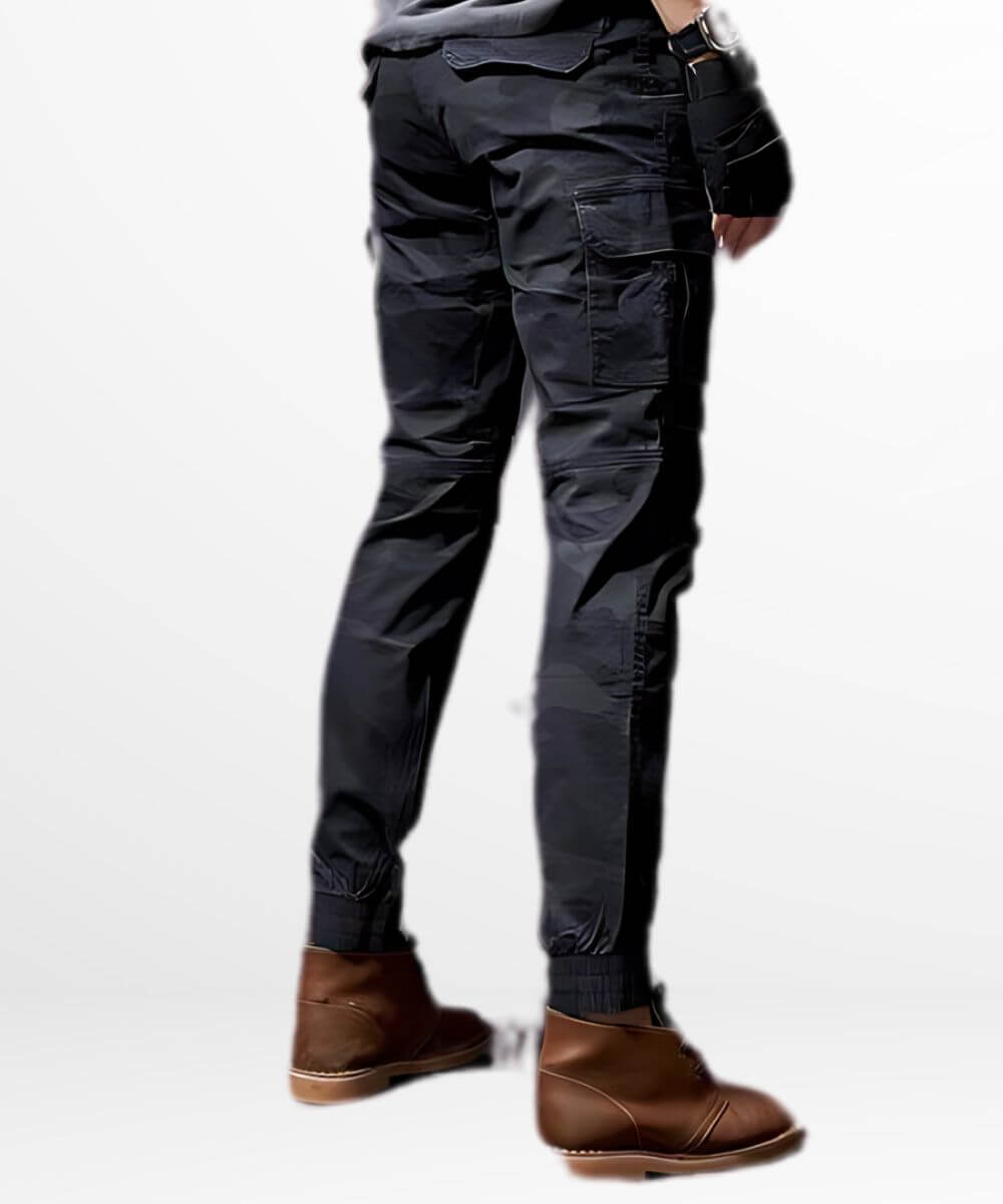 Back view showcasing the fit and pocket detailing of slim camo cargo pants for men, complemented with brown ankle boots.