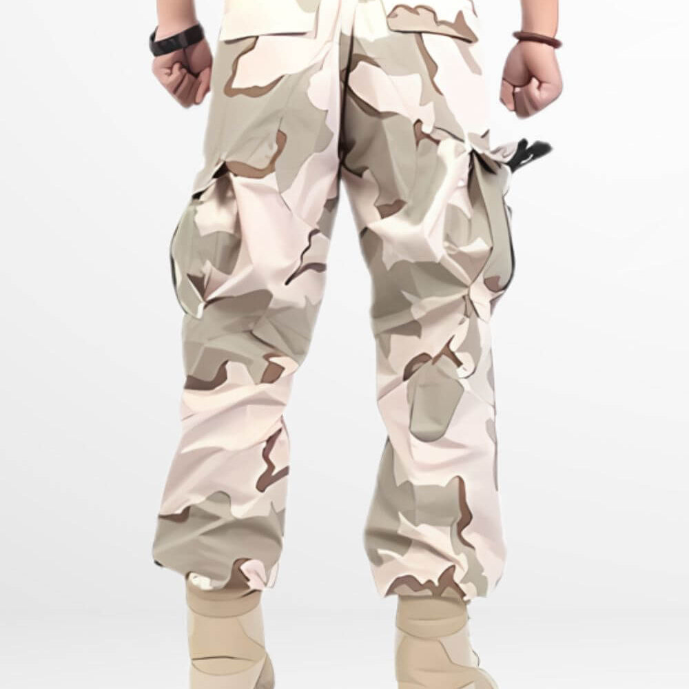Relaxed fit sand camo cargo pants with spacious pockets and a tactical design, complemented by light-colored tactical boots.