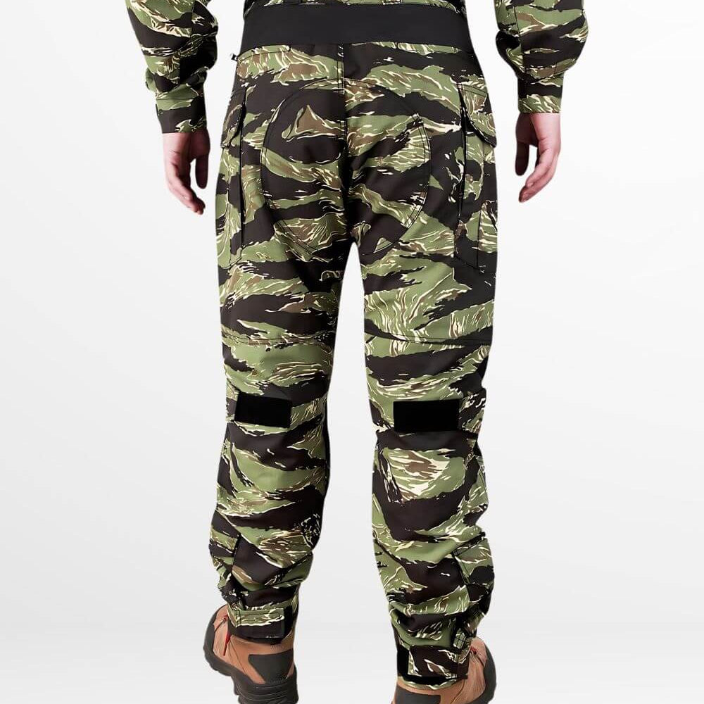 Back view showcasing the concealed zip pockets and adjustable waist tape of tiger stripe camo cargo pants, designed for high mobility and tactical use.