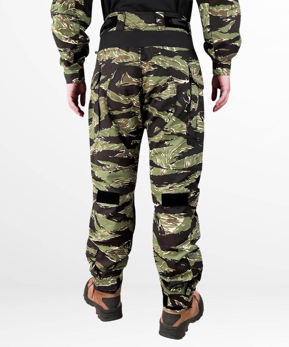 Back view showcasing the concealed zip pockets and adjustable waist tape of tiger stripe camo cargo pants, designed for high mobility and tactical use.