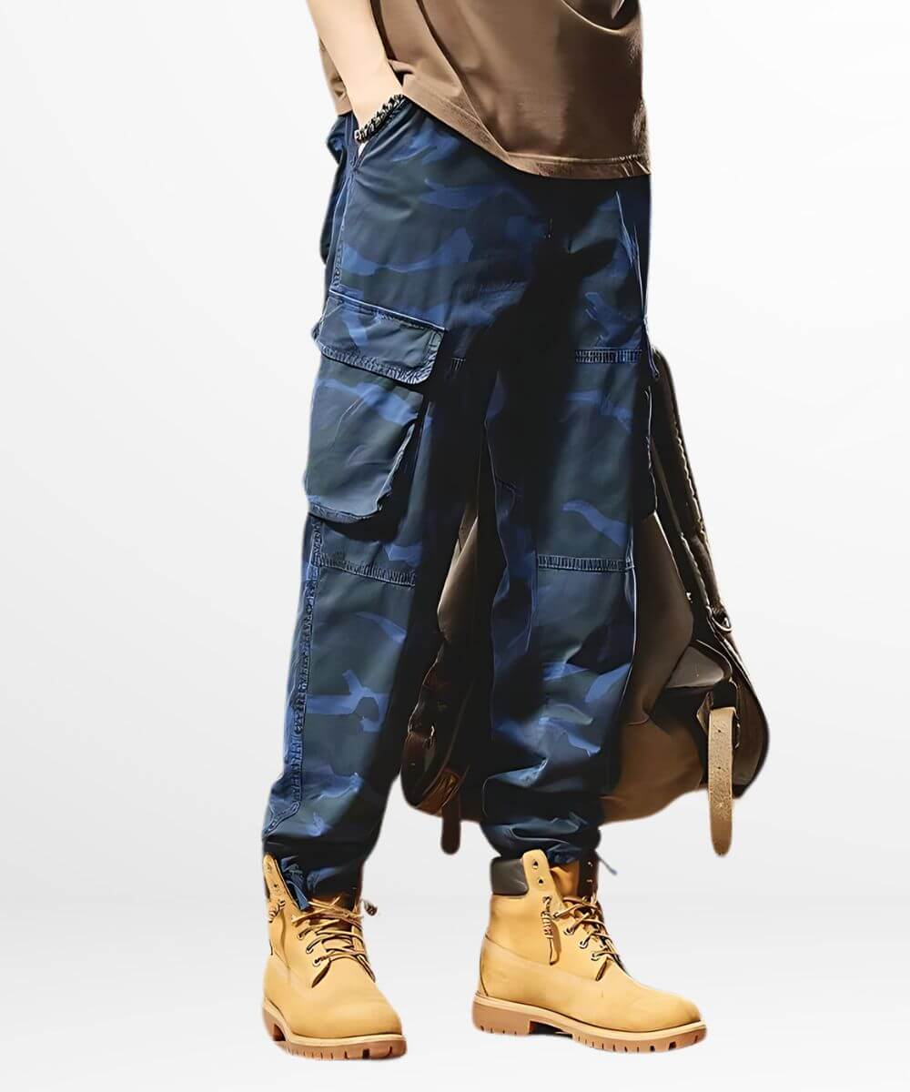 Relaxed fit men's dark blue camo pants showcasing spacious cargo pockets, ideal for urban exploration or casual wear.