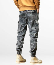 Urban style blue camouflage cargo pants for men, featured with multiple utility pockets.
