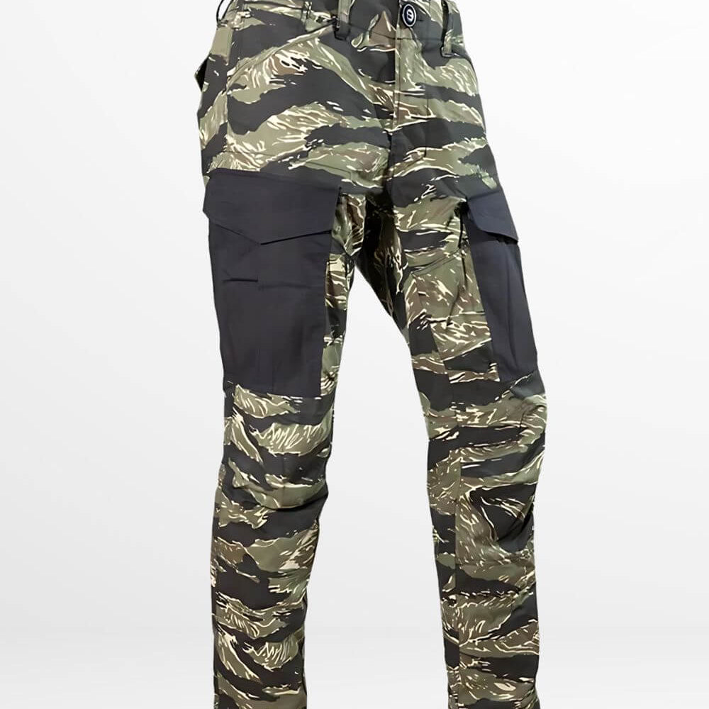 Side view of Vietnam Tiger Stripe camouflage pants featuring contrast black panels and practical cargo pockets.