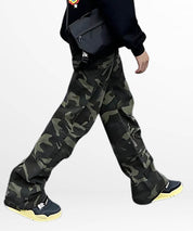 Person walking in stylish flared camo cargo pants, featuring spacious pockets and a comfortable fit.