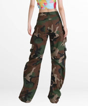 Woman wearing womens cargo pants camouflage with a modern style, paired with white sneakers.