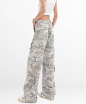 Close-up of the side pocket on women's grey camo cargo pants, illustrating the utility and design.