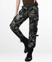 Side view of woman modeling grey camo cargo pants with cinched ankles and a casual belt.