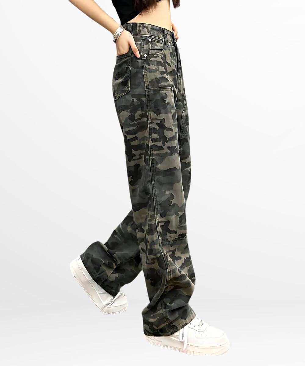 Woman walking in high-waisted camo cargo pants, showcasing the loose fit and stylish design with white sneakers.