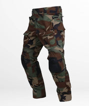 Full profile view of woodland camo cargo pants, emphasizing the practical design and fit for adventure gear.